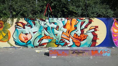 Cyan and Colorful Stylewriting by DCK, Angel and ALL CAPS COLLECTIVE. This Graffiti is located in Hungary and was created in 2019. This Graffiti can be described as Stylewriting and Wall of Fame.