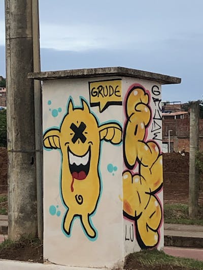 Yellow Characters by Grude. This Graffiti is located in salvador, Brazil and was created in 2021. This Graffiti can be described as Characters, Street Bombing and Throw Up.
