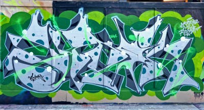 Light Green and Grey and Green Stylewriting by SIDOK. This Graffiti is located in London, United Kingdom and was created in 2022. This Graffiti can be described as Stylewriting and Wall of Fame.