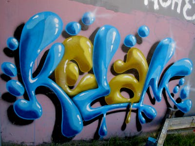 Light Blue and Yellow Stylewriting by Kezam. This Graffiti is located in Auckland, New Zealand and was created in 2023. This Graffiti can be described as Stylewriting and 3D.