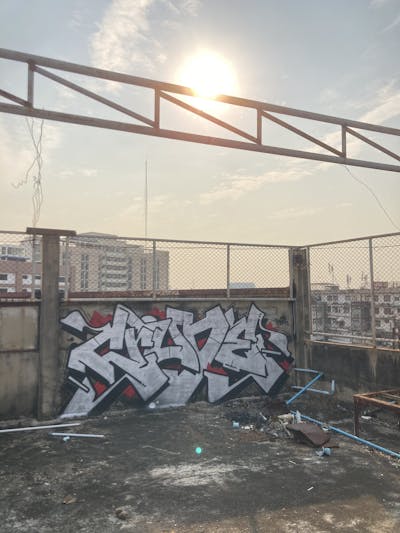 Chrome and Black Stylewriting by Crude. This Graffiti is located in Bangkok, Thailand and was created in 2024. This Graffiti can be described as Stylewriting and Atmosphere.