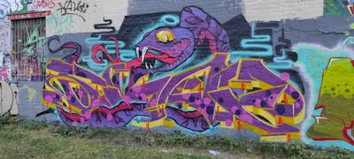 Violet and Colorful Stylewriting by Skaf. This Graffiti is located in Leipzig, Germany and was created in 2022. This Graffiti can be described as Stylewriting, Characters and Wall of Fame.