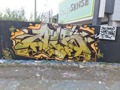 Beige Stylewriting by DPC, TWO, Aisone and WC. This Graffiti is located in North Hampton, United Kingdom and was created in 2024.