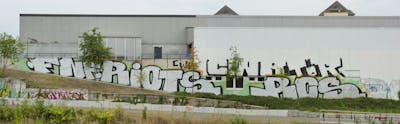 Chrome and Light Green Stylewriting by Riots, RCS, fnf, cwr and tor. This Graffiti is located in Leipzig, Germany and was created in 2019. This Graffiti can be described as Stylewriting and Street Bombing.