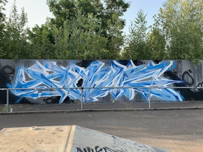 Light Blue and White Stylewriting by Prime. This Graffiti is located in Halle/Saale, Germany and was created in 2022.