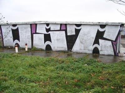 Chrome and Black Stylewriting by urine, Pizar and OST. This Graffiti is located in Delitzsch, Germany and was created in 2005. This Graffiti can be described as Stylewriting and Street Bombing.