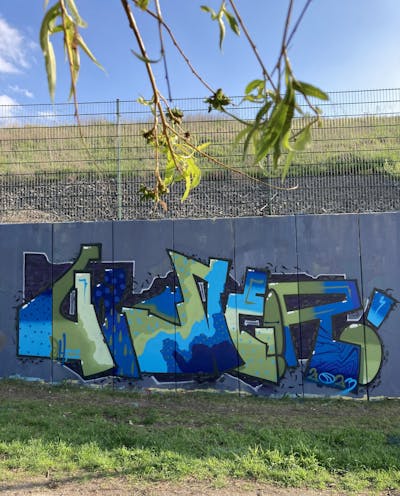 Grey and Light Blue and Light Green Stylewriting by Gauner. This Graffiti is located in Germany and was created in 2023. This Graffiti can be described as Stylewriting and Wall of Fame.