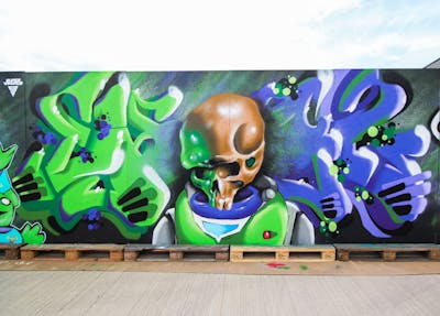 Light Blue and Light Green Stylewriting by Dkeg. This Graffiti is located in Leeds, United Kingdom and was created in 2022. This Graffiti can be described as Stylewriting, Characters and Wall of Fame.