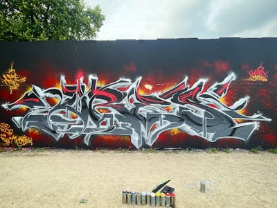 Grey and Red and Yellow Stylewriting by ORES24. This Graffiti is located in Halle (Saale), Germany and was created in 2023. This Graffiti can be described as Stylewriting and Wall of Fame.