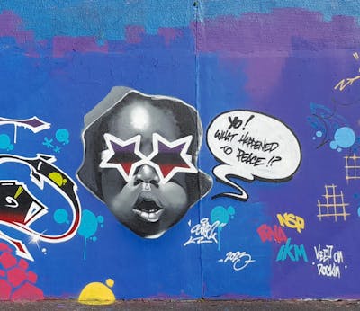 Grey and Colorful and Blue Characters by SAO2971. This Graffiti is located in St helier, Jersey and was created in 2023. This Graffiti can be described as Characters and Wall of Fame.