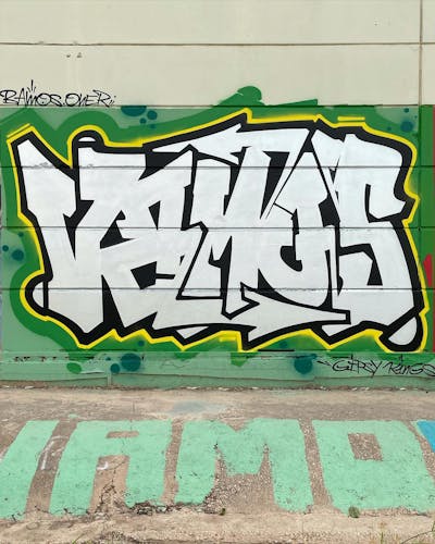 Green and Chrome Stylewriting by Vamos. This Graffiti is located in Valencia, Spain and was created in 2022.