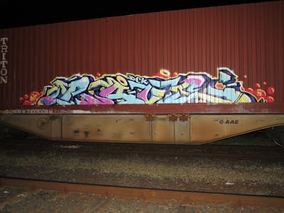 Colorful Stylewriting by DCK, ALL CAPS COLLECTIVE and Rave. This Graffiti is located in Hungary and was created in 2019. This Graffiti can be described as Stylewriting, Trains and Freights.