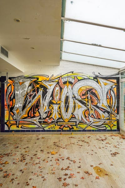 Chrome and Orange Stylewriting by Wios. This Graffiti is located in Spain and was created in 2023. This Graffiti can be described as Stylewriting and Abandoned.