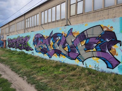 Grey and Violet and Colorful Stylewriting by BROKE420 and BLUE. This Graffiti is located in Magdeburg, Germany and was created in 2024.