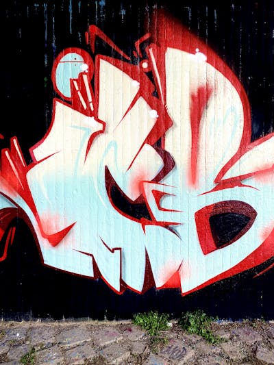 Red and Light Blue Stylewriting by Jibo and MDS. This Graffiti is located in Neuss, Germany and was created in 2022.