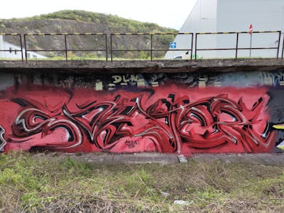 Red and Coralle Stylewriting by Sainter. This Graffiti is located in Bratislava, Slovakia and was created in 2022. This Graffiti can be described as Stylewriting, Abandoned and 3D.