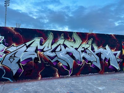 Grey and Colorful Stylewriting by omseg. This Graffiti is located in Berlin, Germany and was created in 2023. This Graffiti can be described as Stylewriting and Wall of Fame.