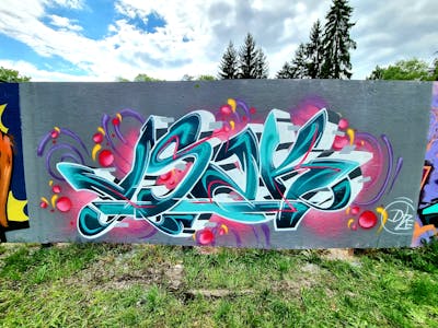 Cyan and Coralle and Grey Stylewriting by Dyze. This Graffiti is located in Switzerland and was created in 2023. This Graffiti can be described as Stylewriting and Wall of Fame.