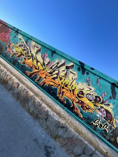 Orange and Yellow and Cyan Stylewriting by Sowet. This Graffiti is located in Livorno, Italy and was created in 2023.