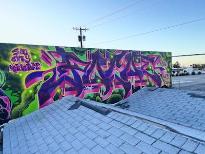 Violet and Coralle and Light Green Stylewriting by MIW and Pocko. This Graffiti is located in Las Vegas, United States and was created in 2024.
