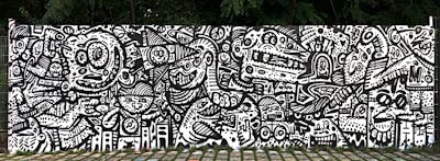 White and Black Wall of Fame by Hülpman, OST and PÜTK. This Graffiti is located in Berlin, Germany and was created in 2021. This Graffiti can be described as Wall of Fame, Characters and Murals.