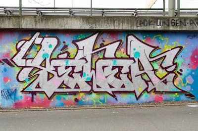 Chrome and Colorful Stylewriting by SEWER. This Graffiti is located in Würzburg, Germany and was created in 2022. This Graffiti can be described as Stylewriting and Wall of Fame.