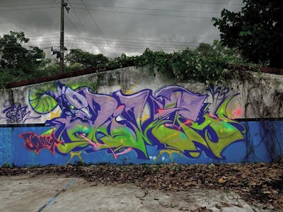 Light Green and Violet and Blue Stylewriting by Oliver trauma and Oliver. This Graffiti is located in Tabasco, Mexico and was created in 2023. This Graffiti can be described as Stylewriting, Characters, Street Bombing and Abandoned.