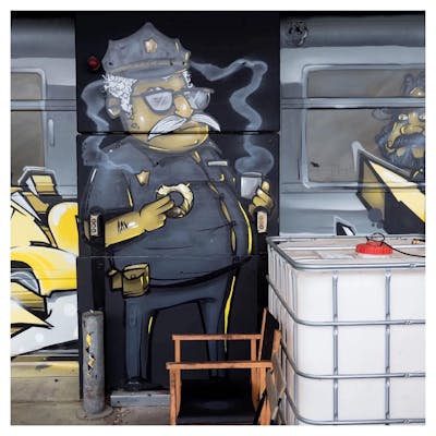Grey and Beige Characters by Niker. This Graffiti is located in Mainz, Germany and was created in 2020.