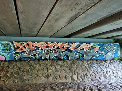 Orange and Grey and Colorful Stylewriting by ESSEX and TNC. This Graffiti is located in Sunshine Coast, Australia and was created in 2023. This Graffiti can be described as Stylewriting and Characters.