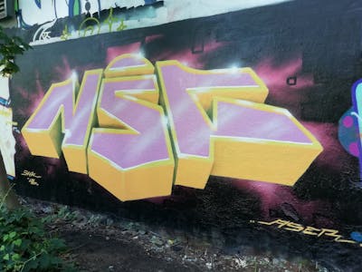 Yellow and Coralle Stylewriting by Aser. This Graffiti is located in Leipzig, Germany and was created in 2022. This Graffiti can be described as Stylewriting and 3D.