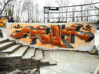 Brown and Orange Stylewriting by Aser. This Graffiti is located in Leipzig, Germany and was created in 2022. This Graffiti can be described as Stylewriting and Wall of Fame.