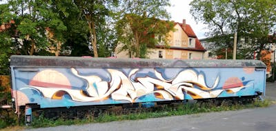 Beige and Light Blue Stylewriting by Roweo and mtl crew. This Graffiti is located in Jena, Germany and was created in 2022. This Graffiti can be described as Stylewriting, Trains, Wall of Fame and Freights.