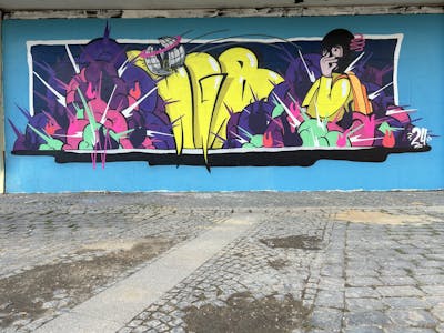 Colorful and Yellow and Violet Stylewriting by Radikalinski and Run. This Graffiti is located in Germany and was created in 2024. This Graffiti can be described as Stylewriting, Characters and Streetart.