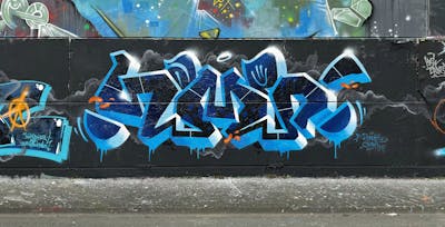 Light Blue and Blue Stylewriting by HAMPI. This Graffiti is located in MÜNSTER, Germany and was created in 2024. This Graffiti can be described as Stylewriting and Wall of Fame.
