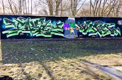 Green and Light Green Stylewriting by split and amir. This Graffiti is located in Germany and was created in 2021. This Graffiti can be described as Stylewriting, Characters and Wall of Fame.