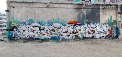 Chrome and Colorful Stylewriting by Fanta, STEM and FAZE183. This Graffiti is located in Munich, Germany and was created in 2021. This Graffiti can be described as Stylewriting, Characters and Abandoned.