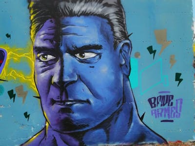 Blue and Colorful Characters by Bfive. This Graffiti is located in Porto, Portugal and was created in 2021. This Graffiti can be described as Characters and Wall of Fame.