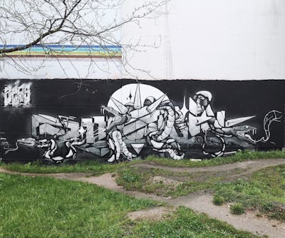 Black and Grey and White Stylewriting by rizok, R120K and bros. This Graffiti is located in Leipzig, Germany and was created in 2021. This Graffiti can be described as Stylewriting, Characters and Wall of Fame.