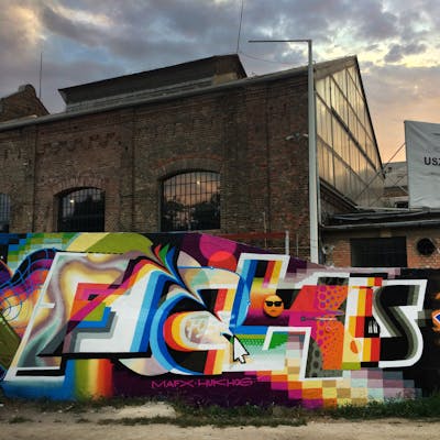Colorful Stylewriting by Fork Imre and Aches. This Graffiti is located in Budapest, Hungary and was created in 2019. This Graffiti can be described as Stylewriting, Futuristic and Murals.