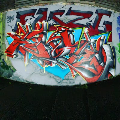 Red and Colorful Stylewriting by EmzG. This Graffiti is located in Zug, Switzerland and was created in 2022.