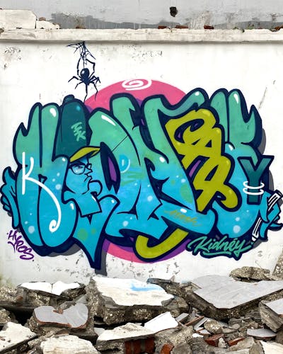 Light Blue and Colorful Stylewriting by Kidney. This Graffiti is located in Bali, Indonesia and was created in 2023. This Graffiti can be described as Stylewriting, Characters and Abandoned.