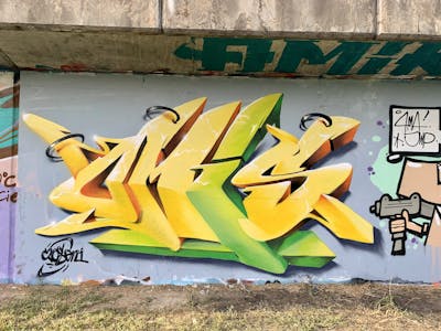 Yellow and Light Green Stylewriting by Czosen1. This Graffiti is located in Warsaw, Poland and was created in 2022. This Graffiti can be described as Stylewriting, 3D and Wall of Fame.