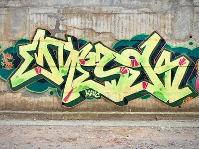 Beige and Green Stylewriting by Mesek. This Graffiti is located in Cali, Colombia and was created in 2023.