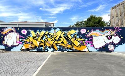 Colorful and Yellow Stylewriting by Octofly Art, Thetan and Thetan one. This Graffiti is located in Marcon, Italy and was created in 2022. This Graffiti can be described as Stylewriting and Characters.