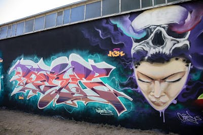 Violet and Colorful Stylewriting by dejoe and Cors One. This Graffiti is located in Berlin, Germany and was created in 2022. This Graffiti can be described as Stylewriting, Characters and Wall of Fame.