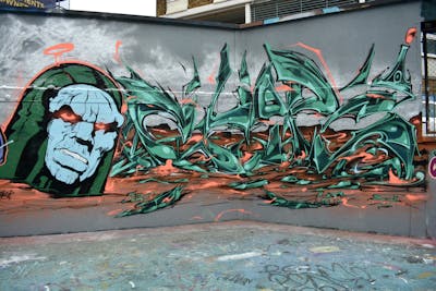 Cyan and Orange and Black Stylewriting by SIDOK, Chips and CDSK. This Graffiti is located in London, United Kingdom and was created in 2023. This Graffiti can be described as Stylewriting and Characters.