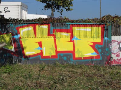 Yellow and Red Stylewriting by urine and KCF. This Graffiti is located in Leipzig, Germany and was created in 2010.