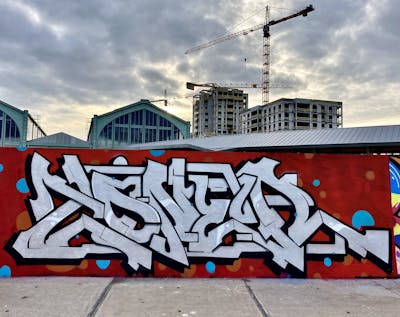 Red and Chrome Stylewriting by Toner2 and OTZ. This Graffiti is located in Belgium and was created in 2020. This Graffiti can be described as Stylewriting and Wall of Fame.