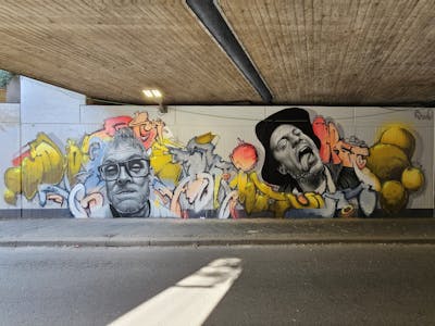 Grey and Colorful and Yellow Stylewriting by Pout and Mister Oreo. This Graffiti is located in bochum, Germany and was created in 2023. This Graffiti can be described as Stylewriting, Characters and Wall of Fame.