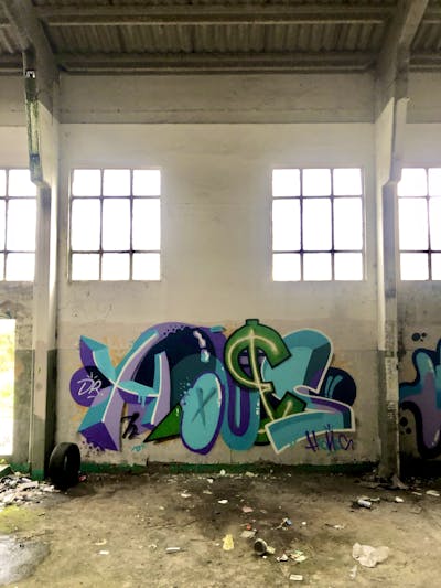 Cyan and Violet Stylewriting by Dr. Hiones. This Graffiti is located in Porto, Portugal and was created in 2024. This Graffiti can be described as Stylewriting and Abandoned.